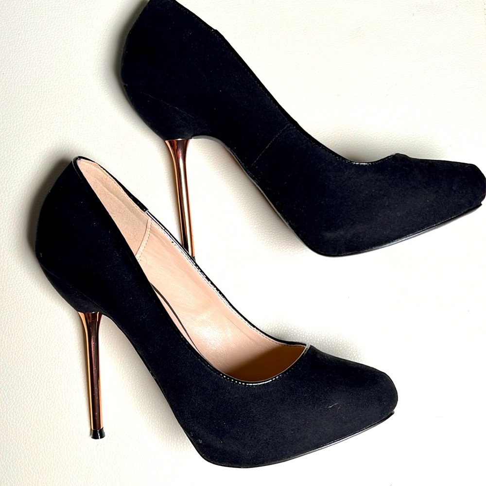 Black and Chrome pumps. Heels. Faux Suede. Never worn. Size 8.